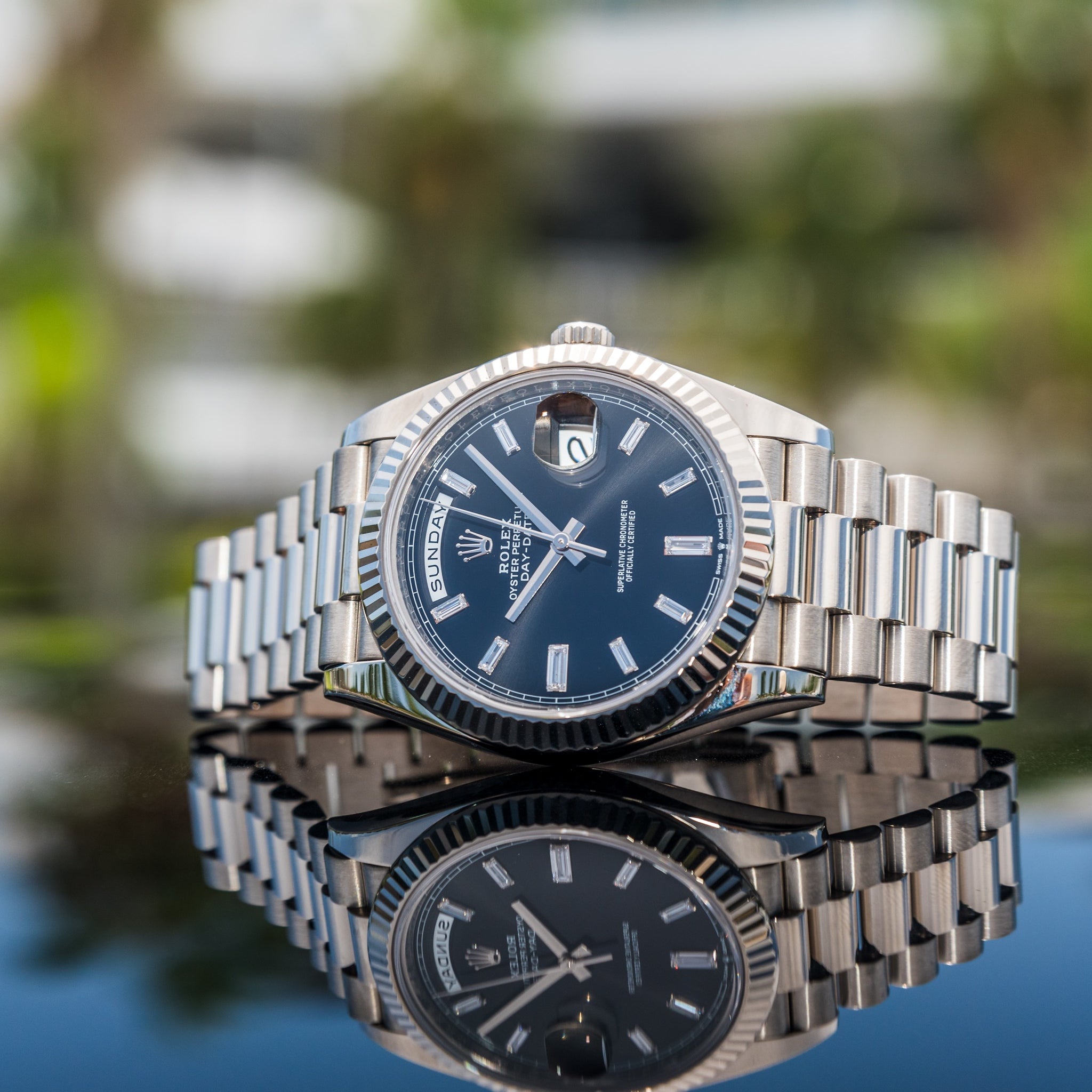 Rolex 2023 Day-Date 40mm 228239 Black Dial Baguette