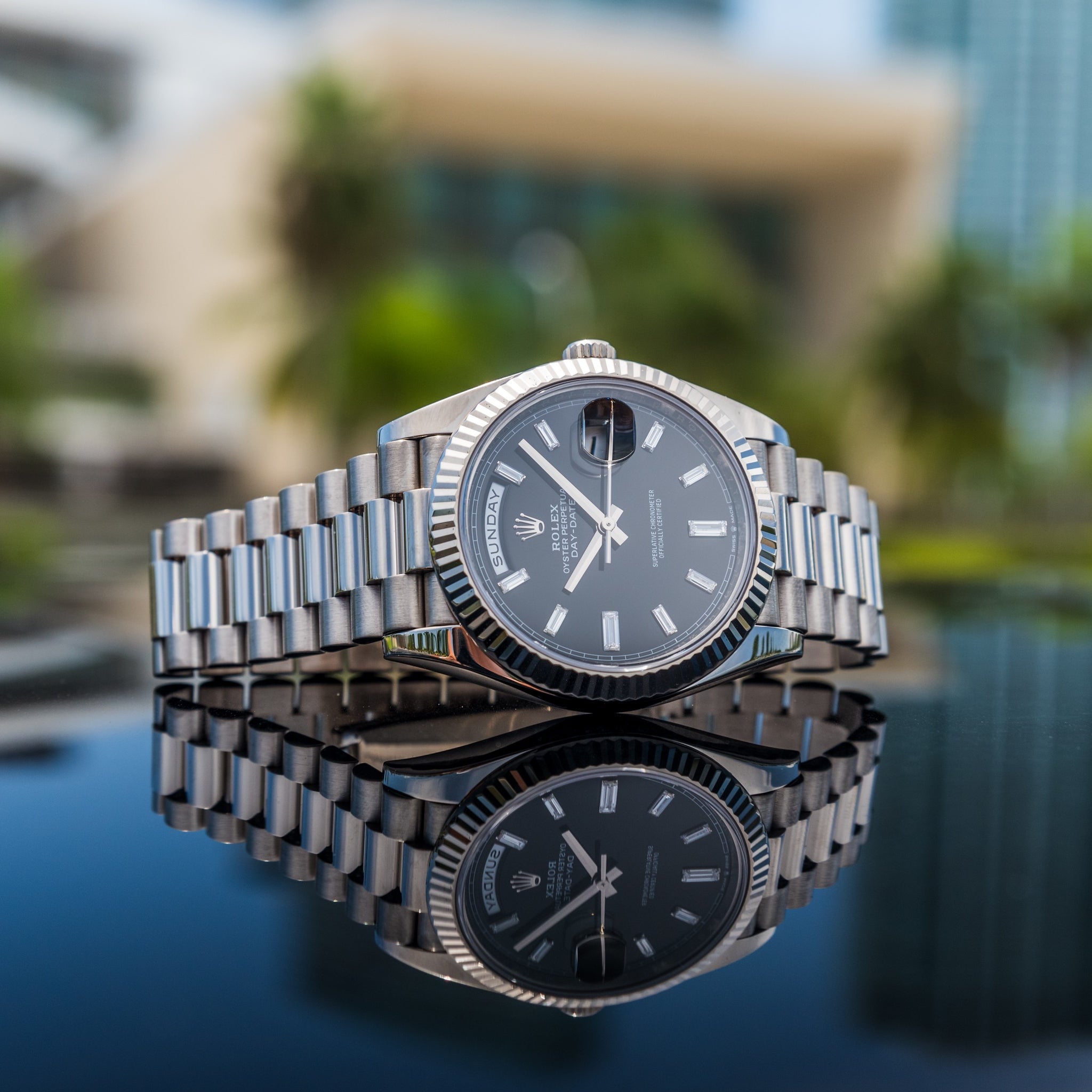 Rolex 2023 Day-Date 40mm 228239 Black Dial Baguette