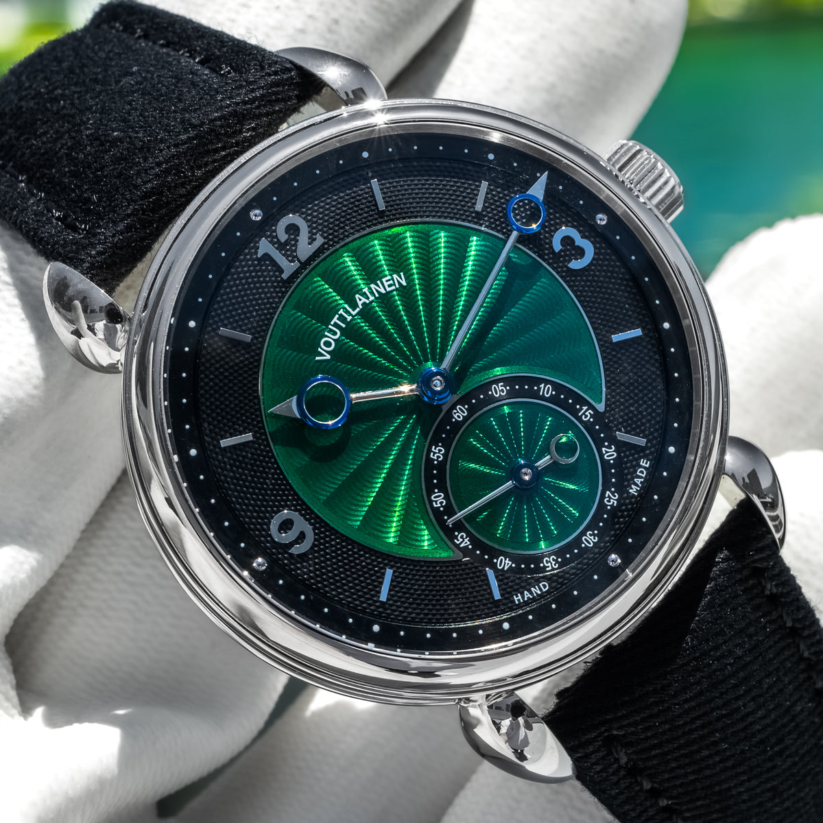 Kari Voutilainen Vingt-8 in platinum with hand-guilloche emerald green dial